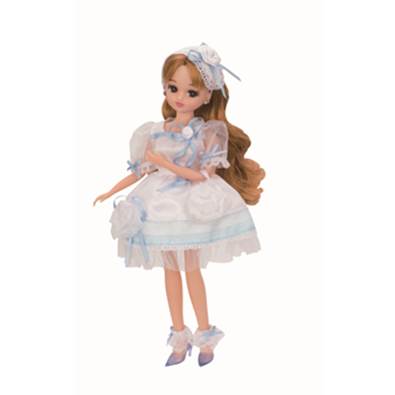 licca chan with blonde wavy hair and a white and blue lolita style coordinate.